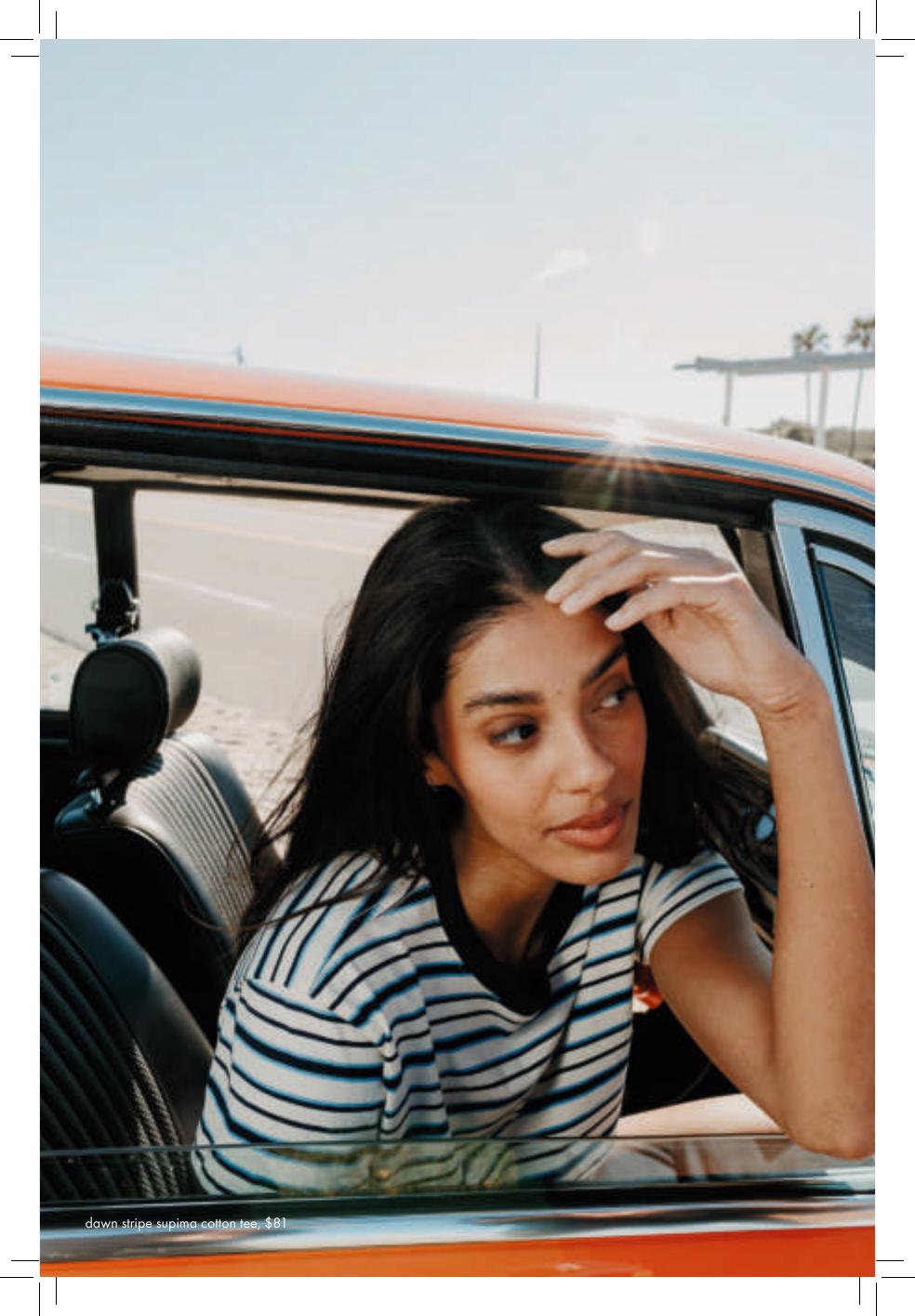 Single-product editorial spread with striped tee styling